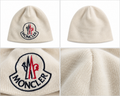 Moncler cremefarvet hue med broderet logo