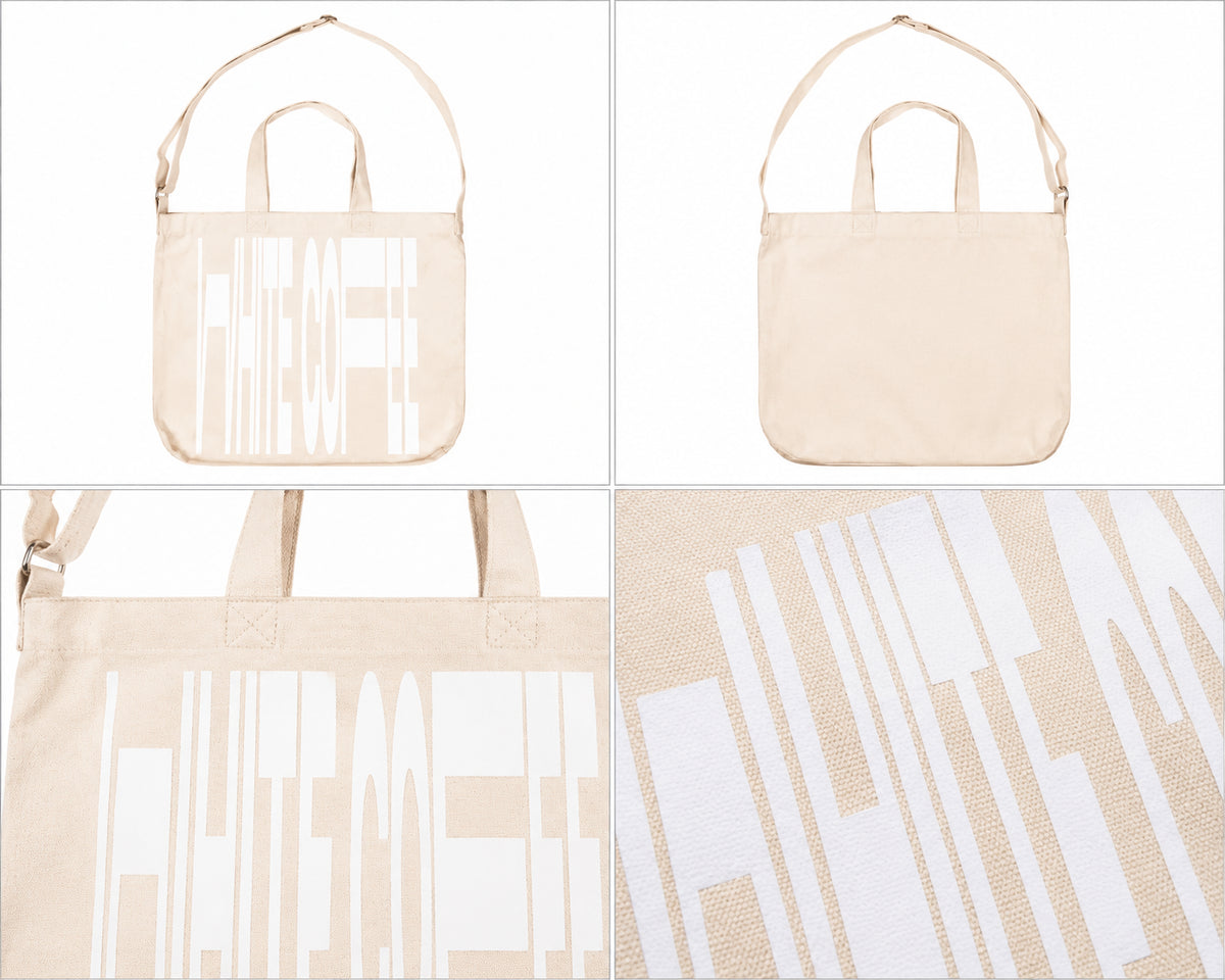 Cremefarvet taske med hvidt print
